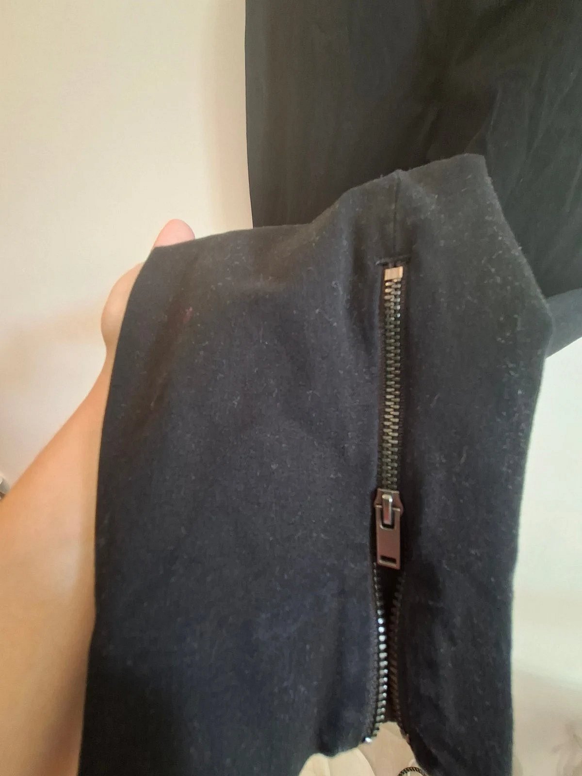 Black stretch ankle zip trousers, photo 2