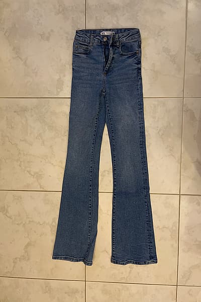 Zara Blue Flare Jeans by Zara — pre-loved on Thrifted.mt