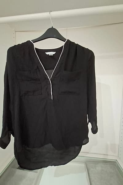 Black blouse with white piping by H&M — pre-loved on Thrifted.mt