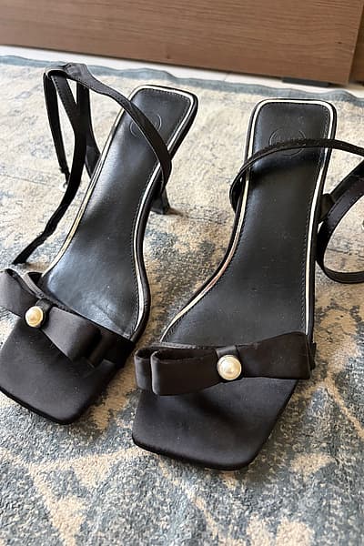 Black satin pearl bow heels — pre-loved on Thrifted.mt