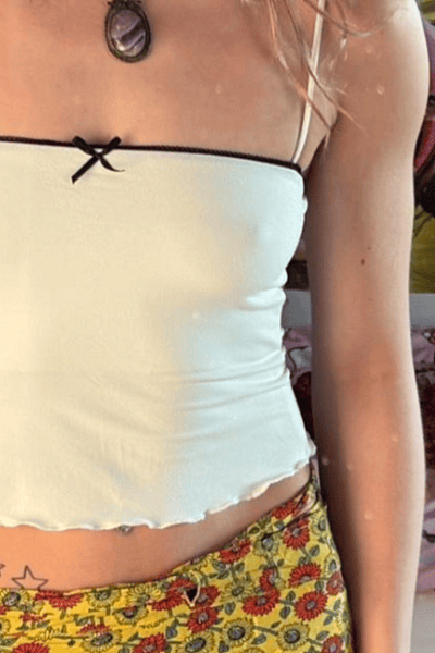 White camisole with black bow by Bershka — pre-loved on Thrifted.mt