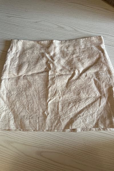 Linen short skirt size L, stone colour by Mango — pre-loved on Thrifted.mt