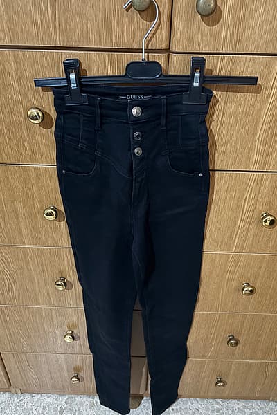 Black High-Waisted Guess Jeans by Guess — pre-loved on Thrifted.mt