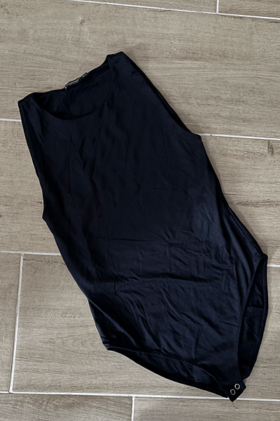 Black sleeveless high neck bodysuit by Stradivarius — pre-loved on Thrifted.mt
