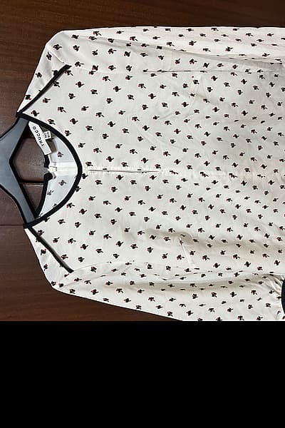 Trucco White Top with print by Trucco — pre-loved on Thrifted.mt