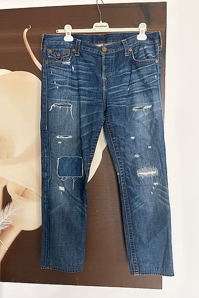 True Religion distressed blue jeans by True Religion — pre-loved on Thrifted.mt