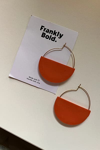 Frankly Bold orange hoop earrings by Frankly Bold — pre-loved on Thrifted.mt