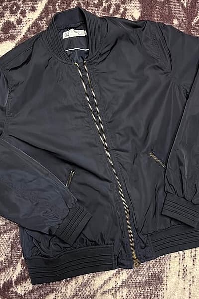 Stylish Black Bomber Jacket by H&M — pre-loved on Thrifted.mt