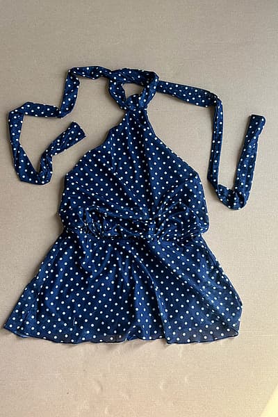 Polka dot halter neck playsuit with open back — pre-loved on Thrifted.mt