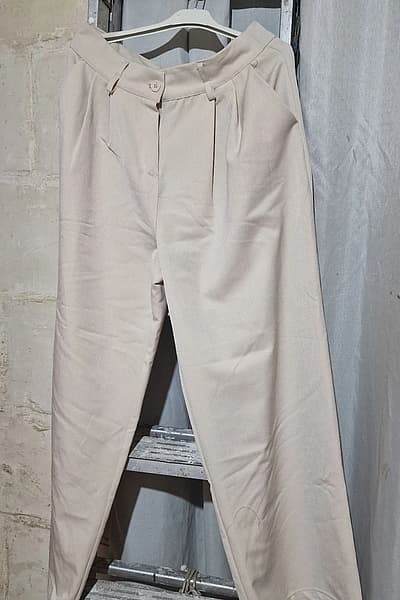 Pleated Beige Wide Leg Trousers — pre-loved on Thrifted.mt