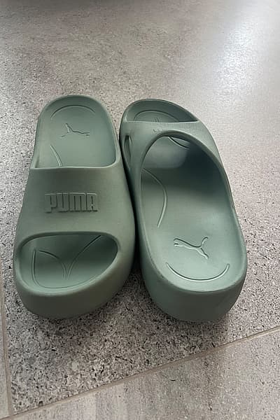 Puma Green Slides by Puma — pre-loved on Thrifted.mt