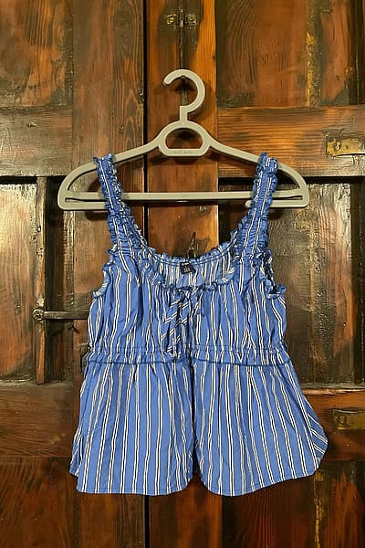 Blue and white striped top by Kiabi — pre-loved on Thrifted.mt