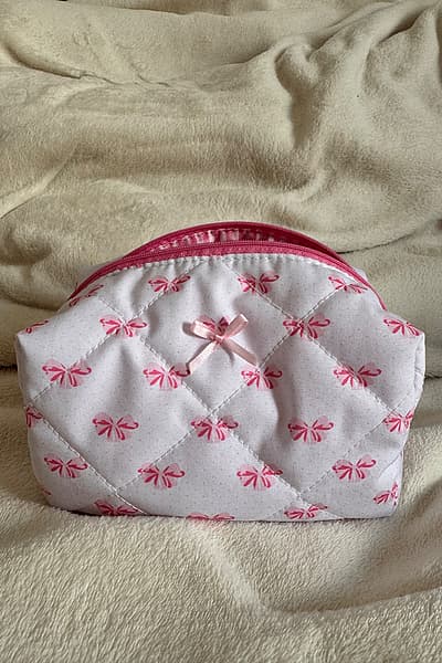 Quilted Pink Bow Makeup Pouch — pre-loved on Thrifted.mt
