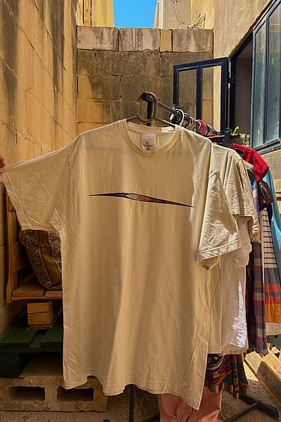 Cream Nike Graphic T-Shirt by Nike — pre-loved on Thrifted.mt