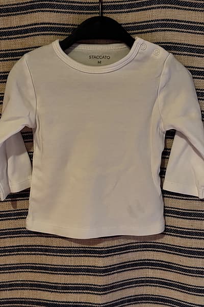 white baby top by Staccato — pre-loved on Thrifted.mt