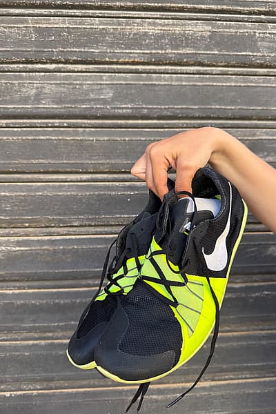 Nike Black Neon Spiked Running Shoes by Nike — pre-loved on Thrifted.mt