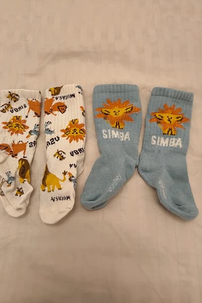 Disney The Lion King socks — pre-loved on Thrifted.mt