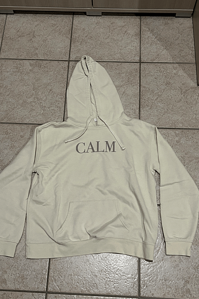 Primark Cream Calm Slogan Hoodie by Primark — pre-loved on Thrifted.mt