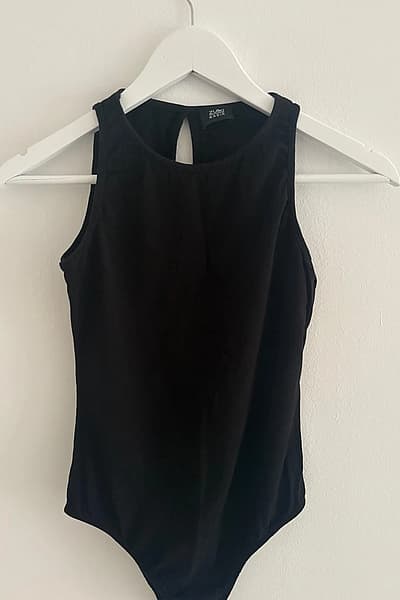 Black Sleeveless Bodysuit by Zuiki Basik — pre-loved on Thrifted.mt