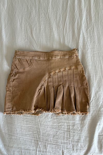 Tan Pleated Mini Skirt by Bershka  — pre-loved on Thrifted.mt