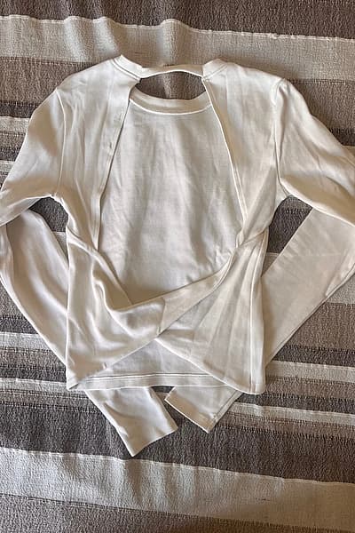 White ZARA long sleeve top with open back by ZARA — pre-loved on Thrifted.mt