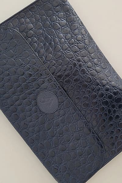 Textured Leather Clutch — pre-loved on Thrifted.mt