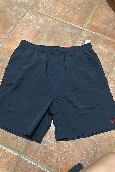 Navy French connection swim shorts  by French connection  — pre-loved on Thrifted.mt
