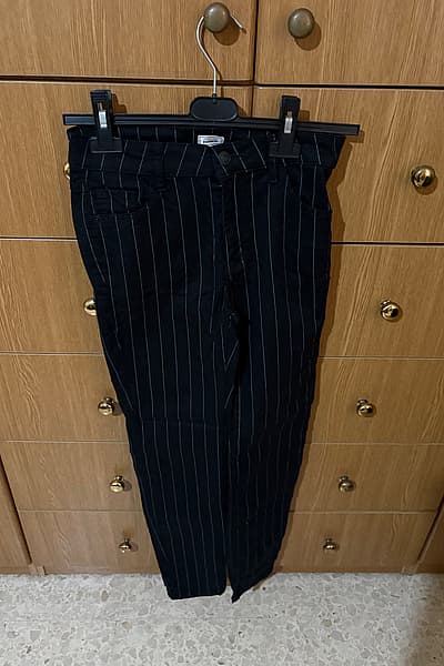 Pimkie black pinstripe trousers — pre-loved on Thrifted.mt