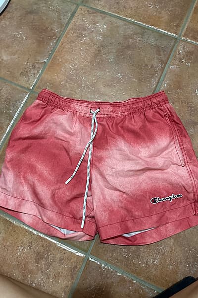 Champion Red Tie-Dye Swim Shorts by Champion — pre-loved on Thrifted.mt