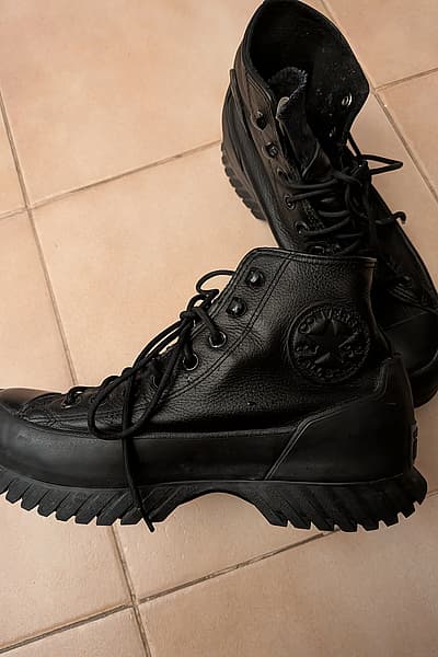 Black Leather High-Top Boots by Converse — pre-loved on Thrifted.mt