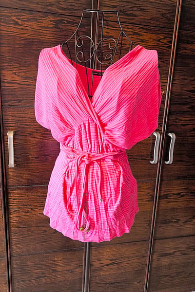 Bright pink tie-waist top by Egzotik Asortik — pre-loved on Thrifted.mt