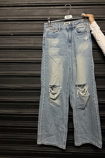 Distressed Light Wash Wide Jeans by Tally Weijl — pre-loved on Thrifted.mt