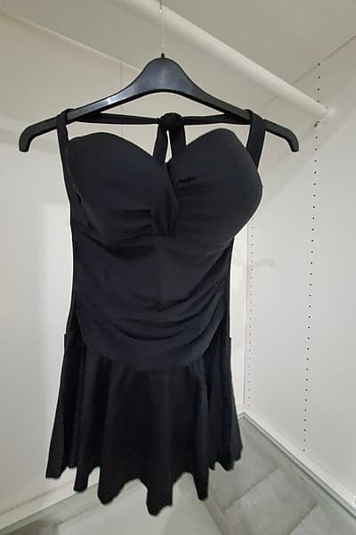 Black ruched skirt swimsuit — pre-loved on Thrifted.mt