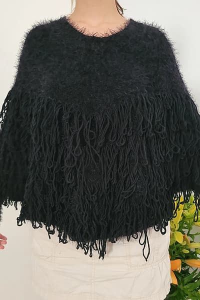 Black poncho with sleeves  by Apricot — pre-loved on Thrifted.mt