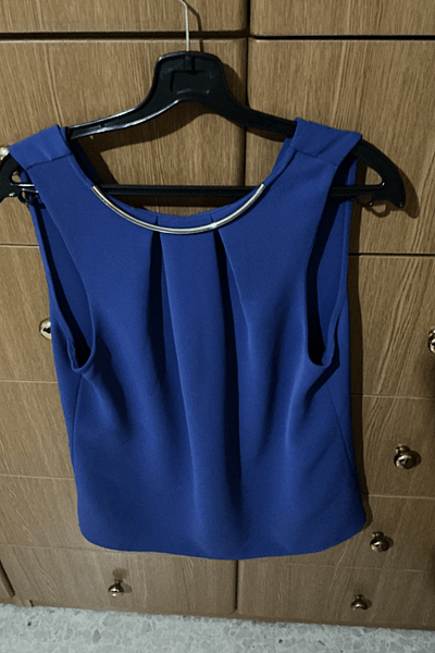 Calvin Klein Blue sleeveless pleated top by Calvin Klein — pre-loved on Thrifted.mt