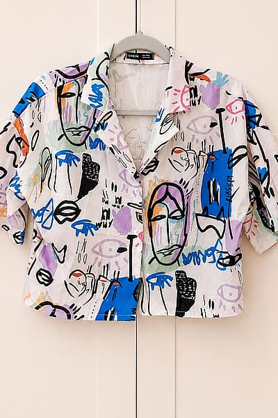 Abstract graffiti print button-up shirt by Shein — pre-loved on Thrifted.mt