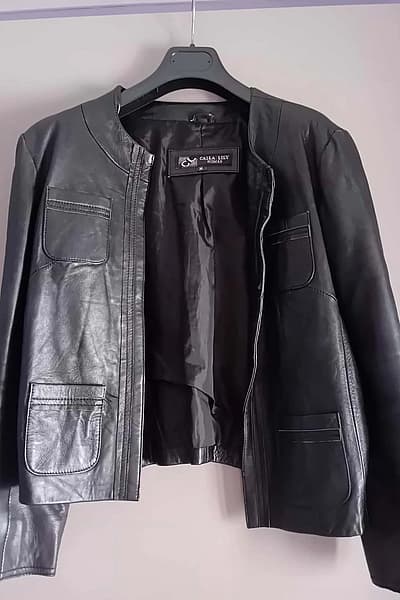 Black leather collarless jacket by Calla Lily Woman — pre-loved on Thrifted.mt