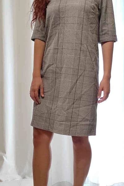 Checked V‑neck Dress by KIABI — pre-loved on Thrifted.mt