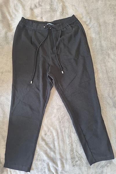 Zara Elegant Black Trousers  by ZARA — pre-loved on Thrifted.mt