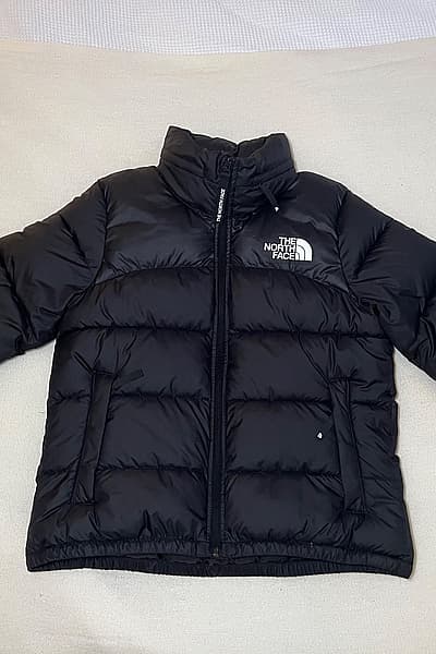 Black The North Face Puffer by The North Face — pre-loved on Thrifted.mt