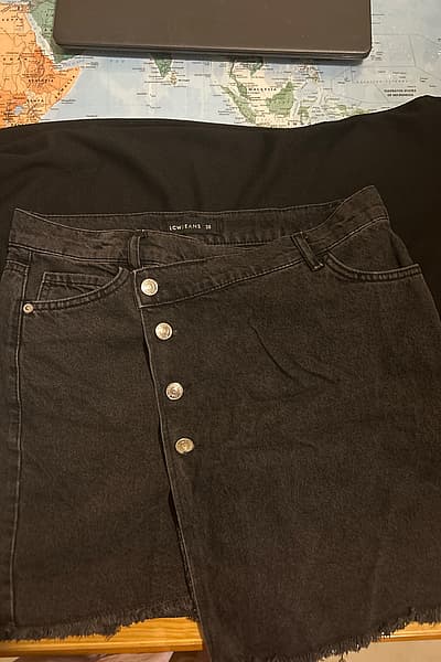 Black asymmetrical button denim skirt by LC Waikiki — pre-loved on Thrifted.mt