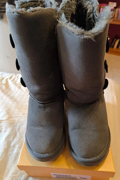 Grey UGG Bailey Button Boots by UGG — pre-loved on Thrifted.mt
