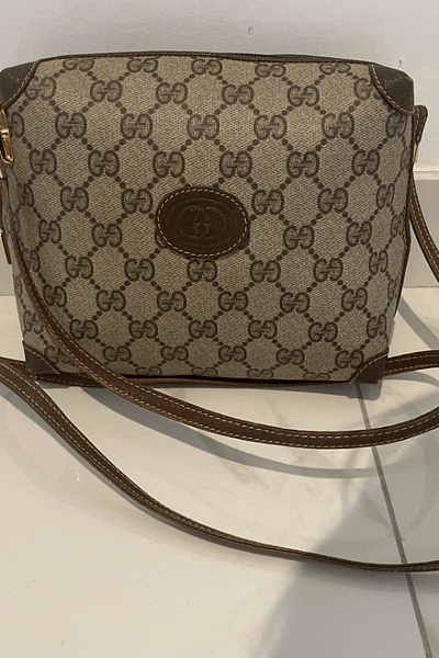 Vintage Gucci GG Supreme Interlocking G Crossbody Bag by Gucci — pre-loved on Thrifted.mt