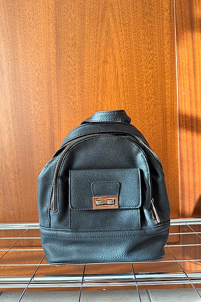 New Look Black-Gold Mini Backpack — pre-loved on Thrifted.mt