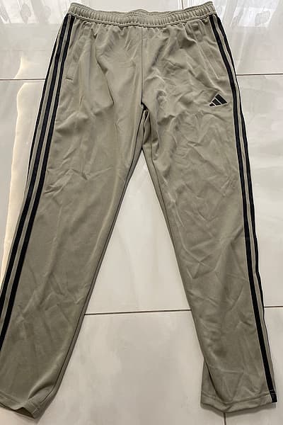 Adidas classic three stripe joggers by Adidas — pre-loved on Thrifted.mt