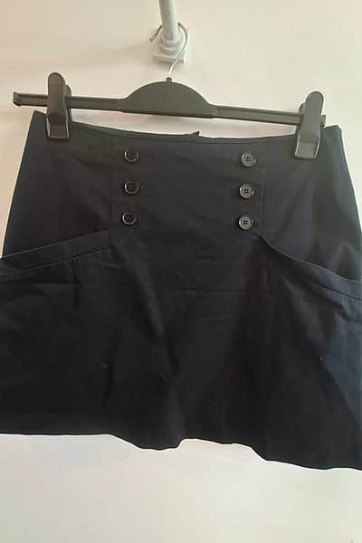 Black button detail mini skirt by H&M — pre-loved on Thrifted.mt
