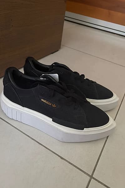 Adidas Sleek Black Platform Sneakers by Adidas — pre-loved on Thrifted.mt