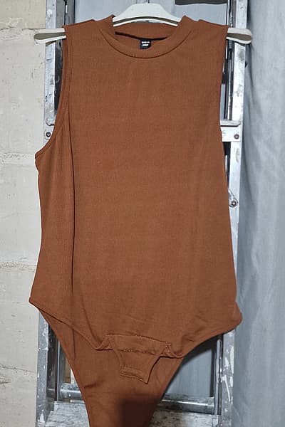 Ribbed Sleeveless Bodysuit by SHEIN — pre-loved on Thrifted.mt