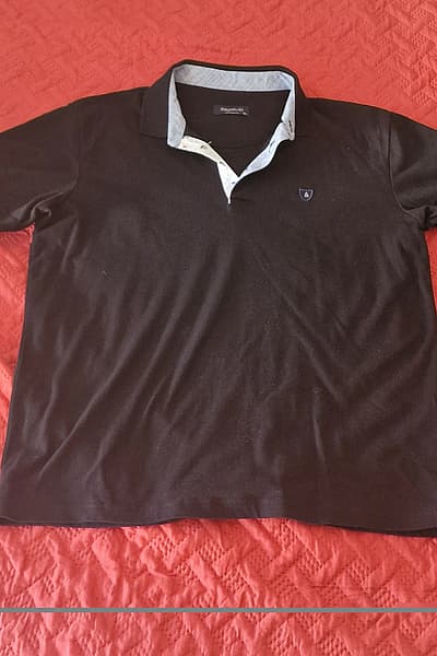 Rugatchi men's short-sleeve polo shirt in size XL. by Rugatchi — pre-loved on Thrifted.mt
