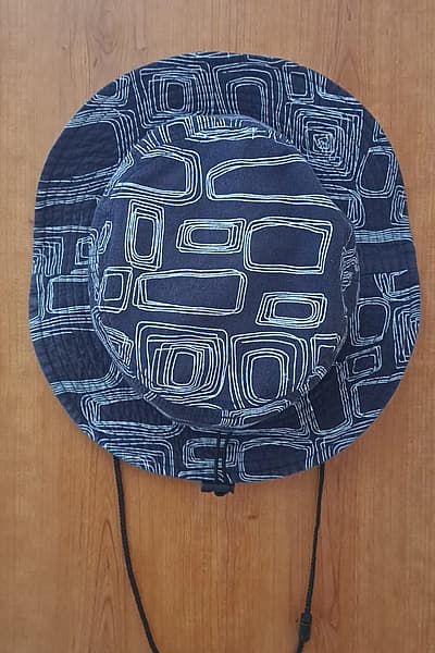 Khat Patterned Navy Bucket Hat — pre-loved on Thrifted.mt